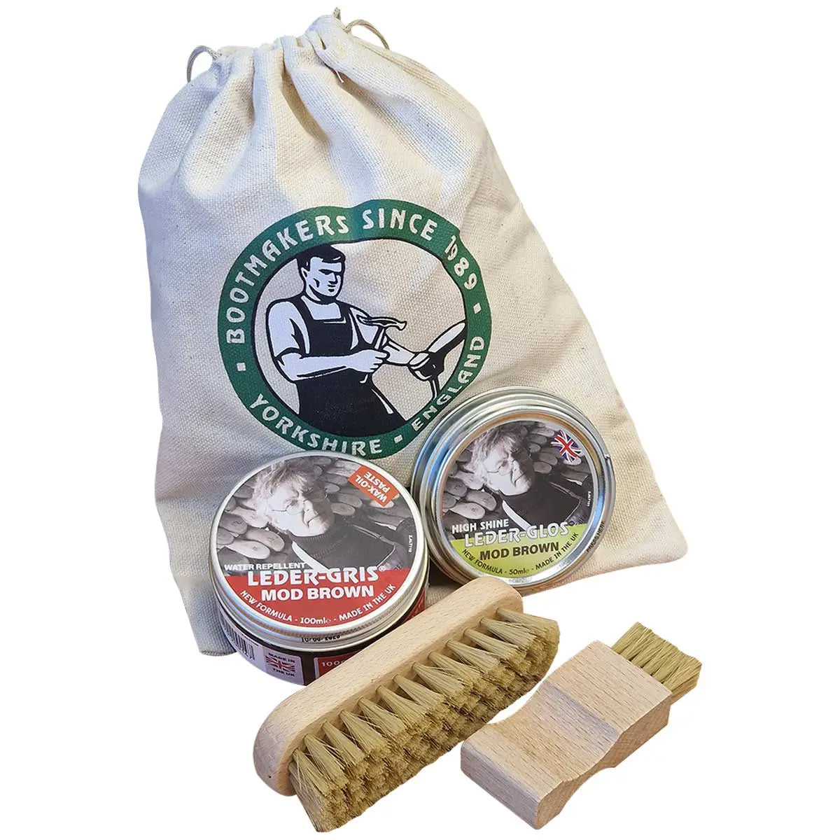 Boot care kit with brushes and polish tins