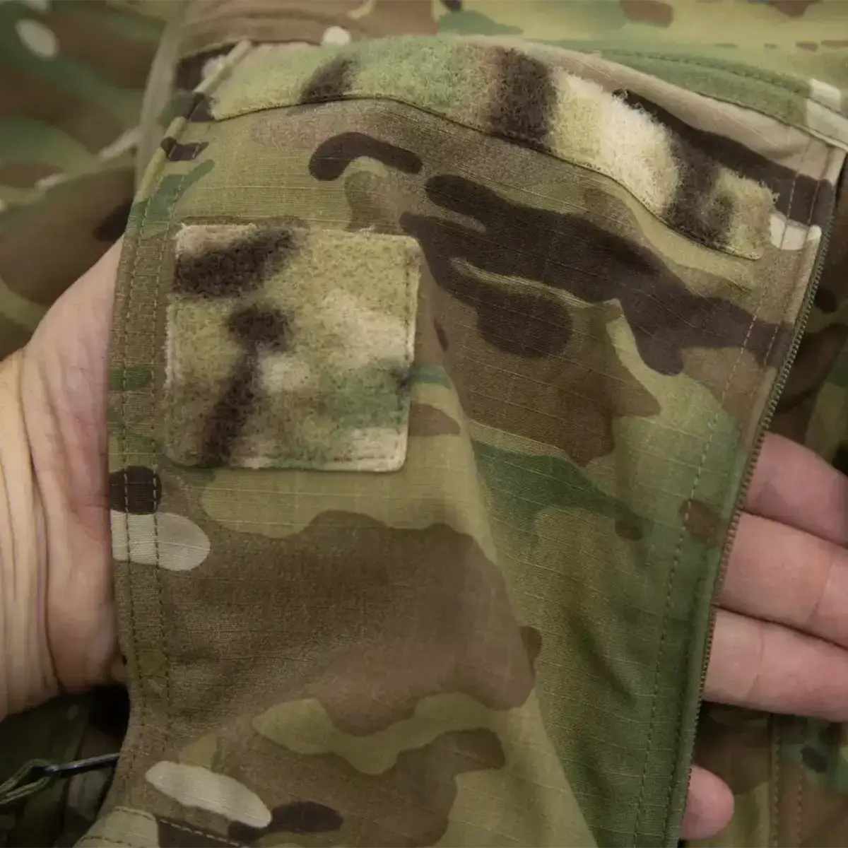 Multicam camouflage jacket with Velcro patches and zip pocket from John Bull Clothing