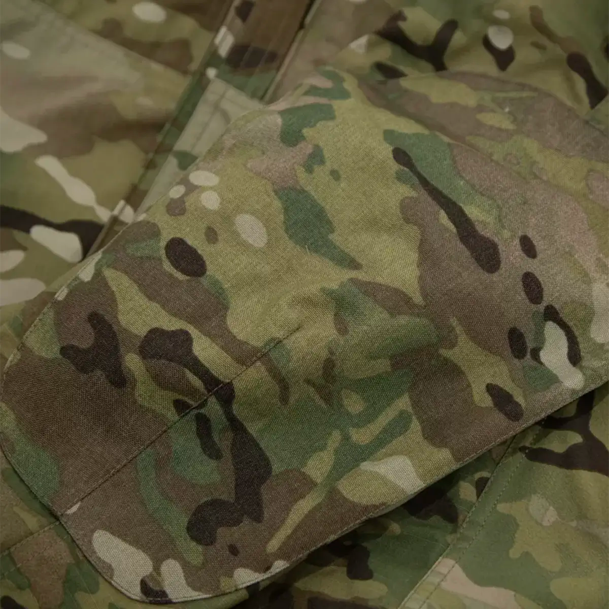 Multicam camouflage tactical jacket with multiple pockets and zippers