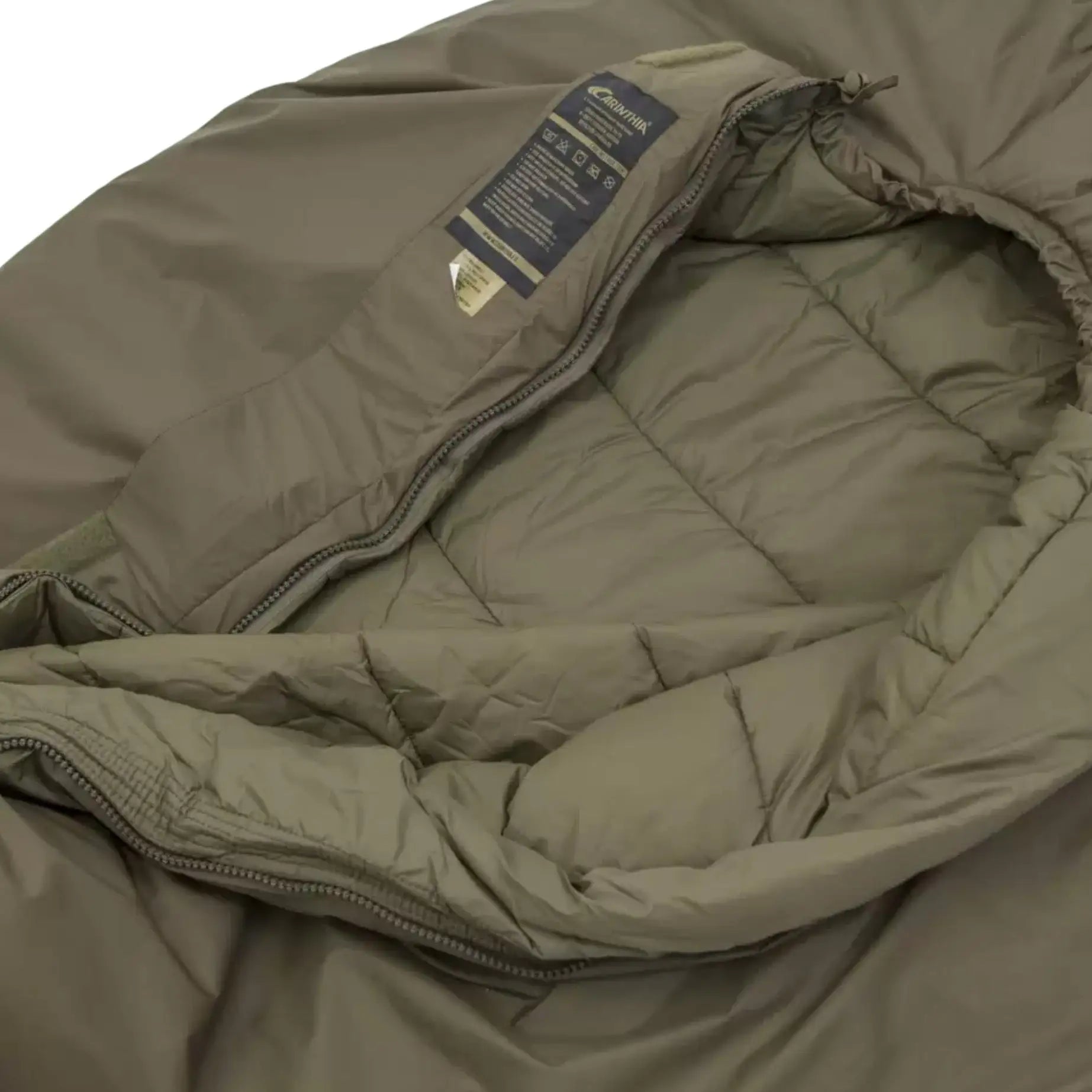 Detailed view of the Carinthia Defence 4 Sleeping Bag Olive Green interior, showing its quilted lining and durable fabric for maximum comfort. from John Bull Clothing