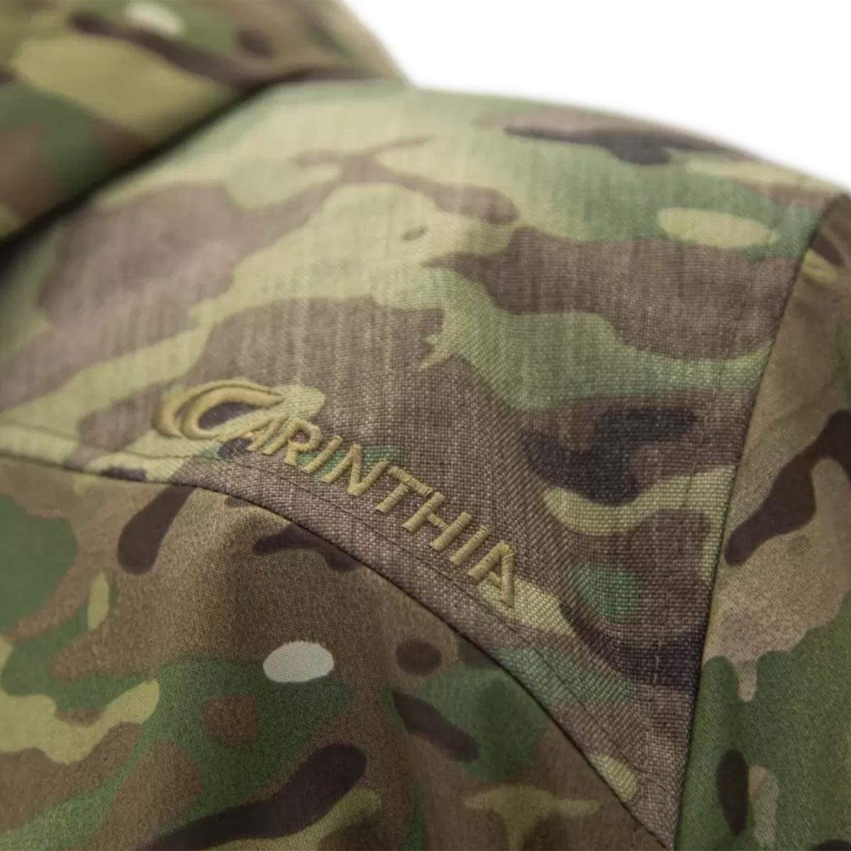 Carinthia branding embroidered on the shoulder of MIG 4.0 Jacket G-Loft Multicam, emphasizing premium craftsmanship and durability.