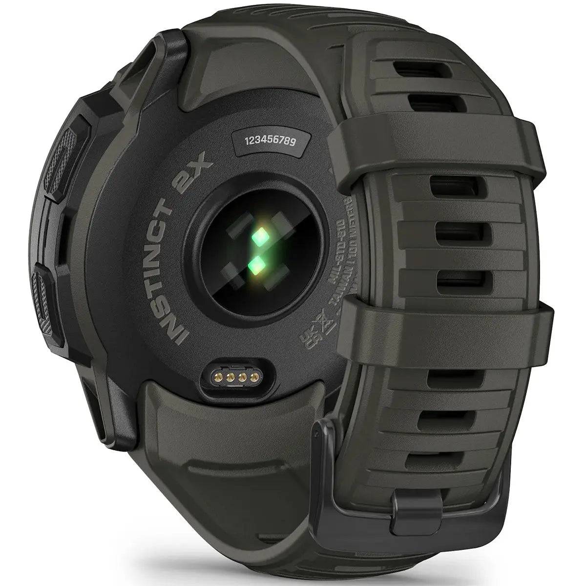 Back view of Garmin Instinct 2X Solar GPS Smartwatch showing heart rate sensor and charging port, designed for durability and performance.