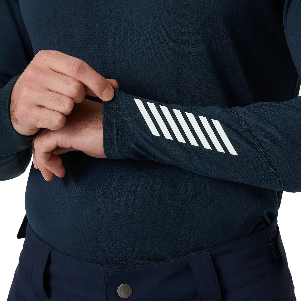 Close-up of sleeve detail on navy HH Lifa Active Crew Long Sleeve Base Layer with white stripes, highlighting technical design at John Bulls.