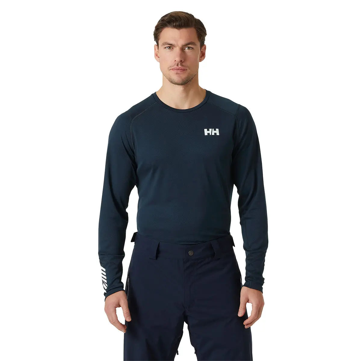 Front view of male model in navy HH Lifa Active Crew Long Sleeve Base Layer, ideal for activewear layering at John Bulls.