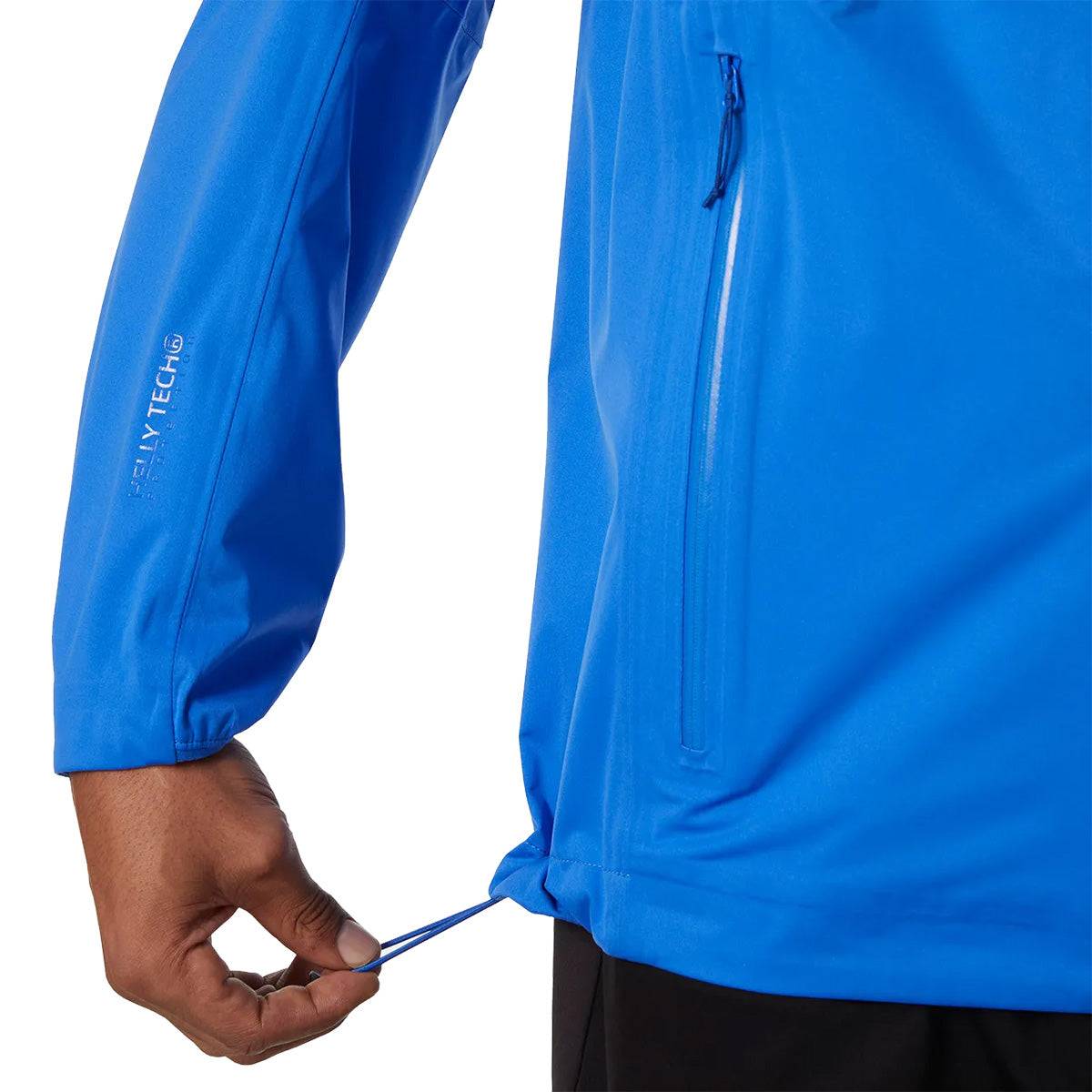 Adjustable hem drawcord on Helly Hansen Mens Momentum 3 Layer Stretch Waterproof Jacket in blue, offering customizable fit and wind protection.
