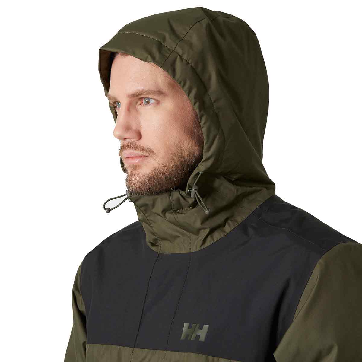 Close-up of a model wearing the Helly Hansen Men's Vancouver Fleece Lined Jacket with hood up, showcasing adjustable drawstrings for a secure fit.