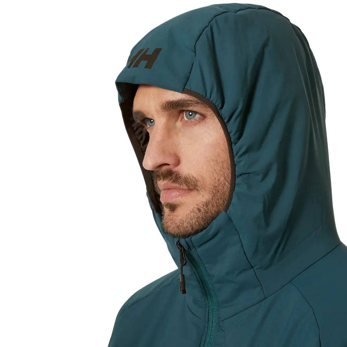 Close-up of the Helly Hansen Odin Stretch Hood Insulator 2.0 Jacket hood, highlighting its snug fit and insulated design for enhanced protection against the elements.