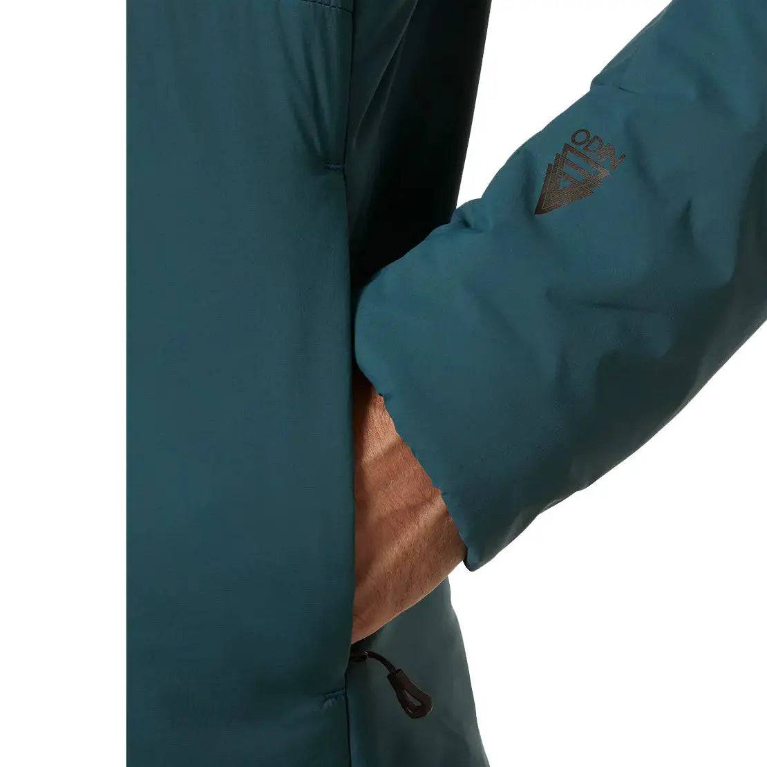 Side pocket detail of the Helly Hansen Odin Stretch Hood Insulator 2.0 Jacket, designed for easy access and secure storage during outdoor activities.