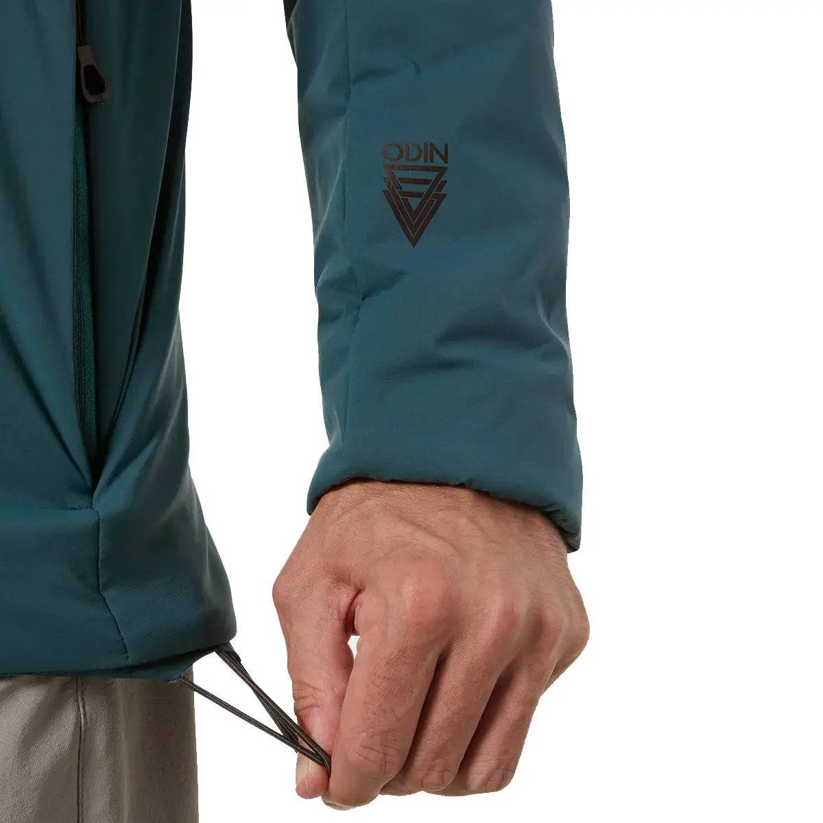 Adjustable hem detail of the Helly Hansen Odin Stretch Hood Insulator 2.0 Jacket, featuring a drawcord for a customizable fit and improved heat retention.