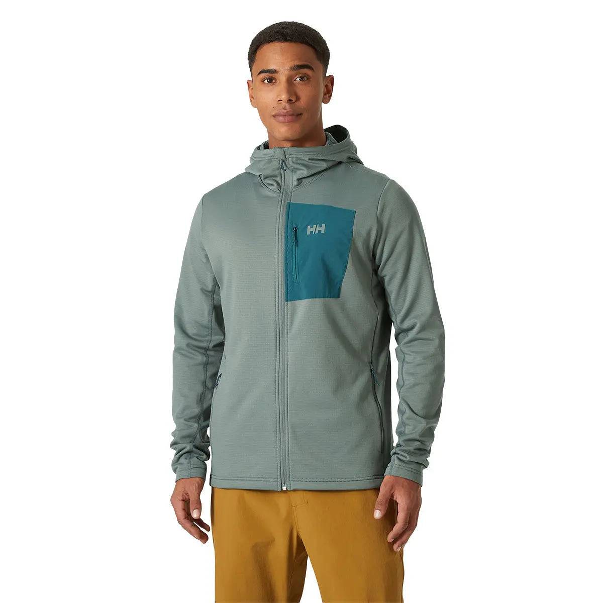 Model wearing the Helly Hansen Versalite Hooded Fleece Jacket in green, displaying the full-zip front, zippered chest pocket, and comfortable fit.