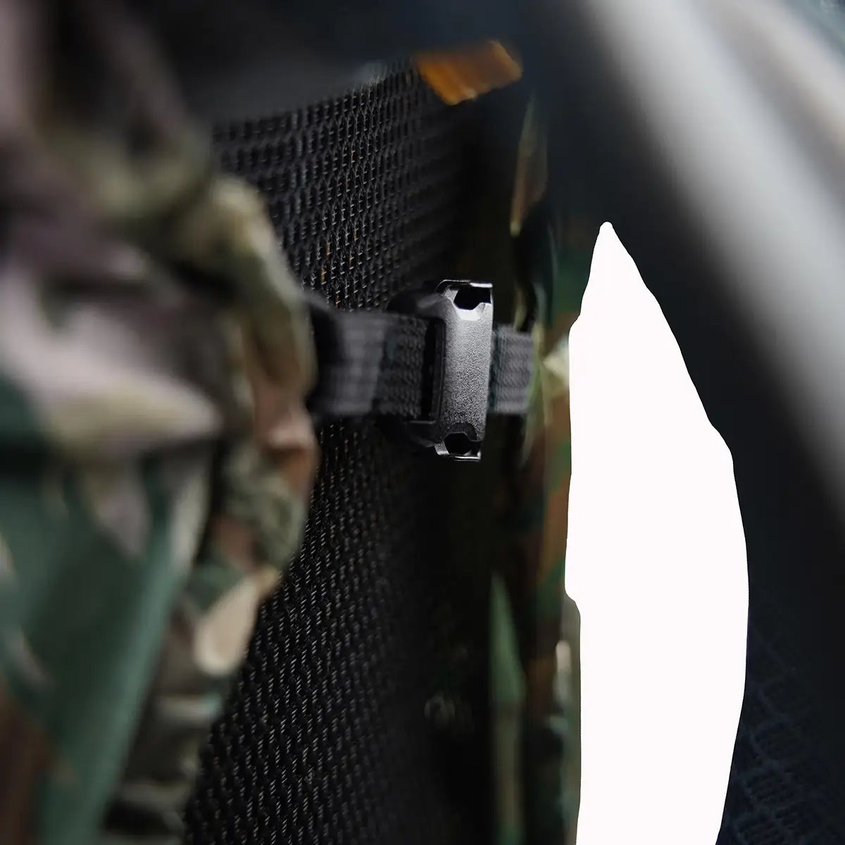 Interior view of Highlander Duck's Back Raincover Medium showing secure buckle strap for firm attachment to backpack frames.