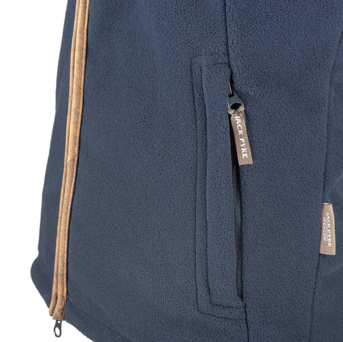Detail of navy Jack Pyke Countryman Fleece Gilet zippered pocket with branded pull tab, highlighting secure storage and fleece material.