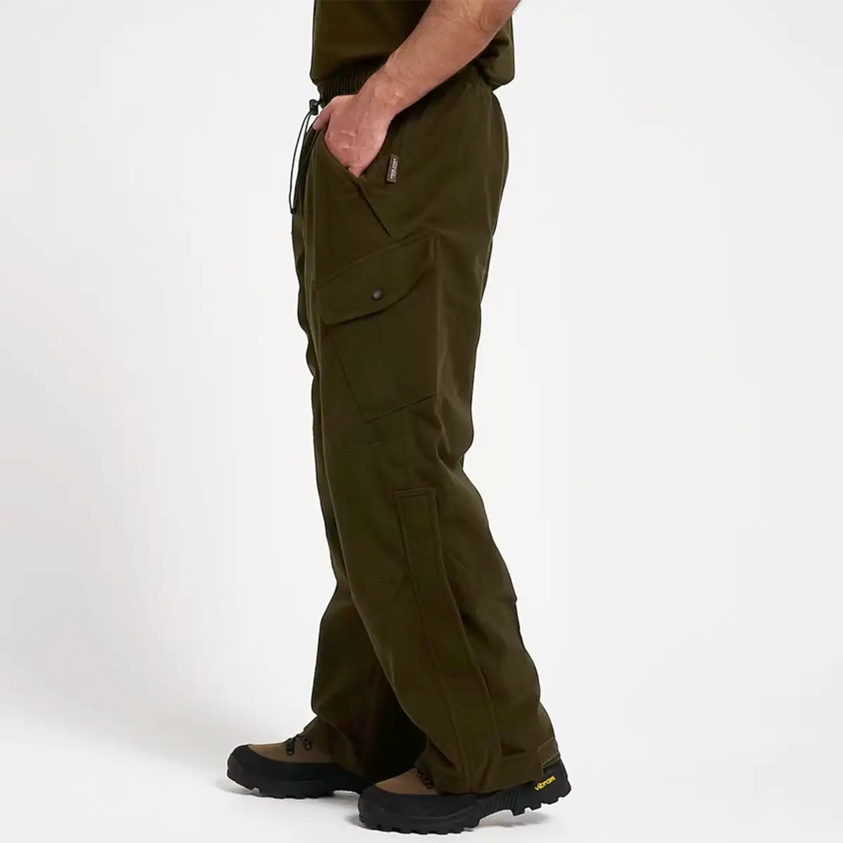 Side view of Jack Pyke Hunters Trousers Green Waterproof with cargo pockets, ideal for outdoor and hunting wear from John Bulls.
