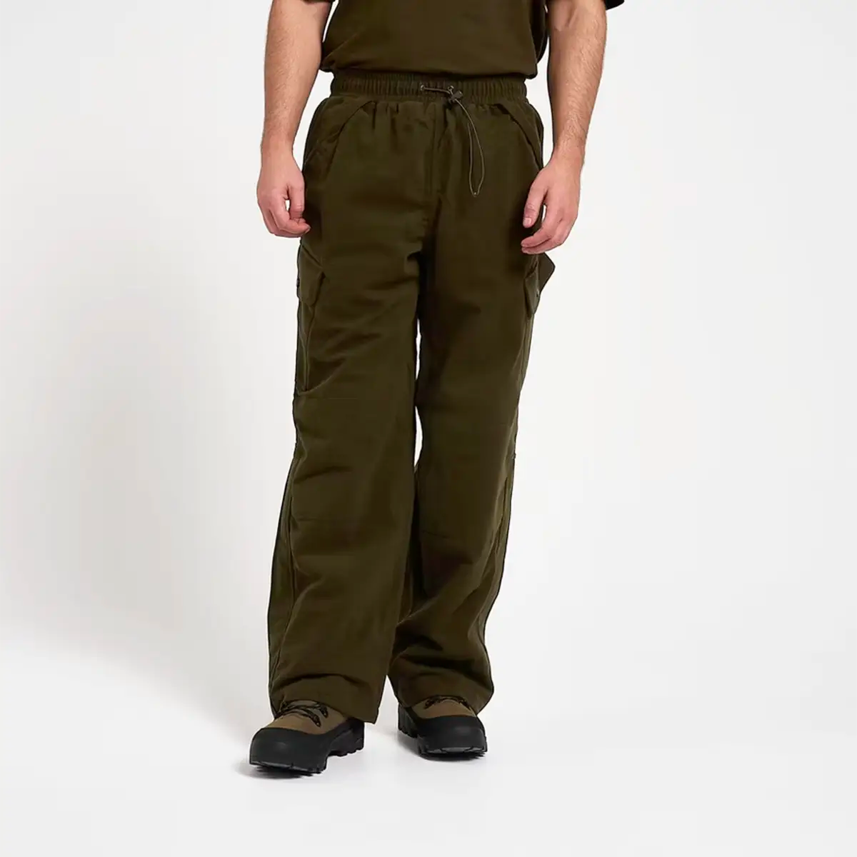 Frontal view of Jack Pyke Hunters Trousers Green Waterproof with relaxed fit and weather-resistant material for field use.