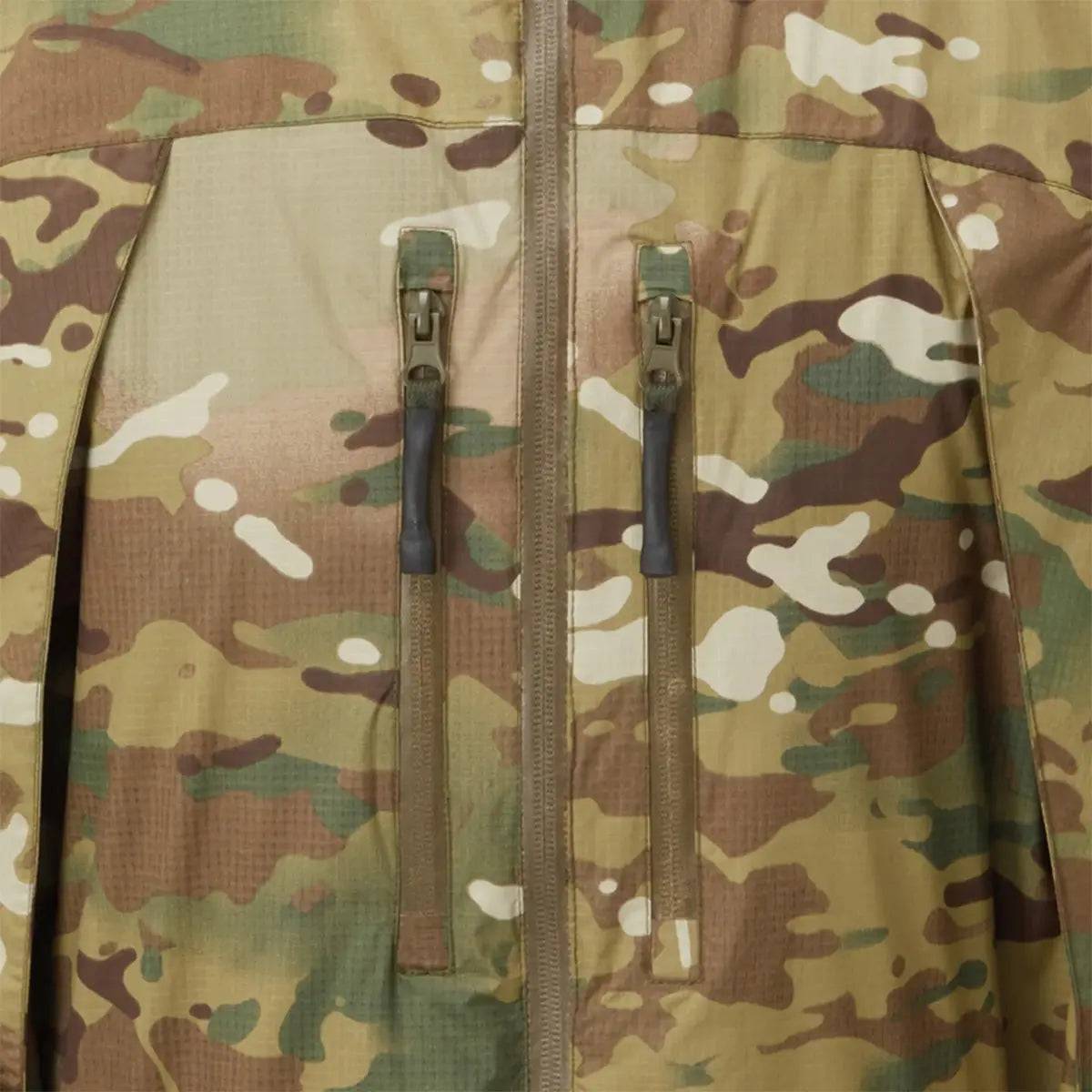 Close-up of the Keela Thor Waterproof Multicam Jacket's chest pockets with water-repellent YKK zippers for secure storage in tactical operations.