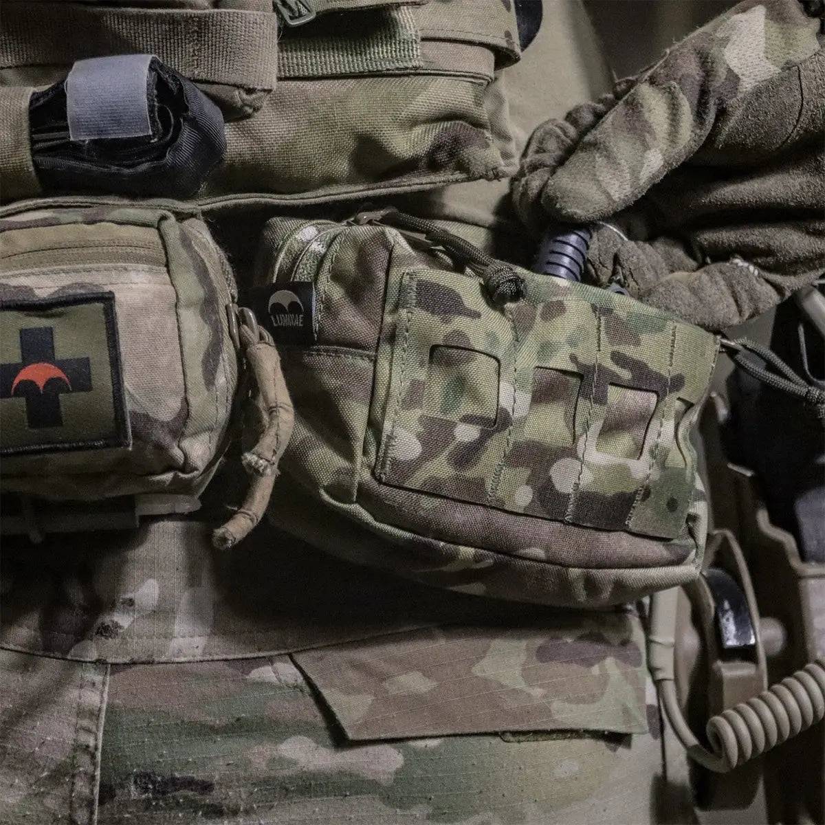 Luminae Multicam Small GP Pouch MTP attached to a tactical vest, demonstrating its practical design for military and outdoor applications.
