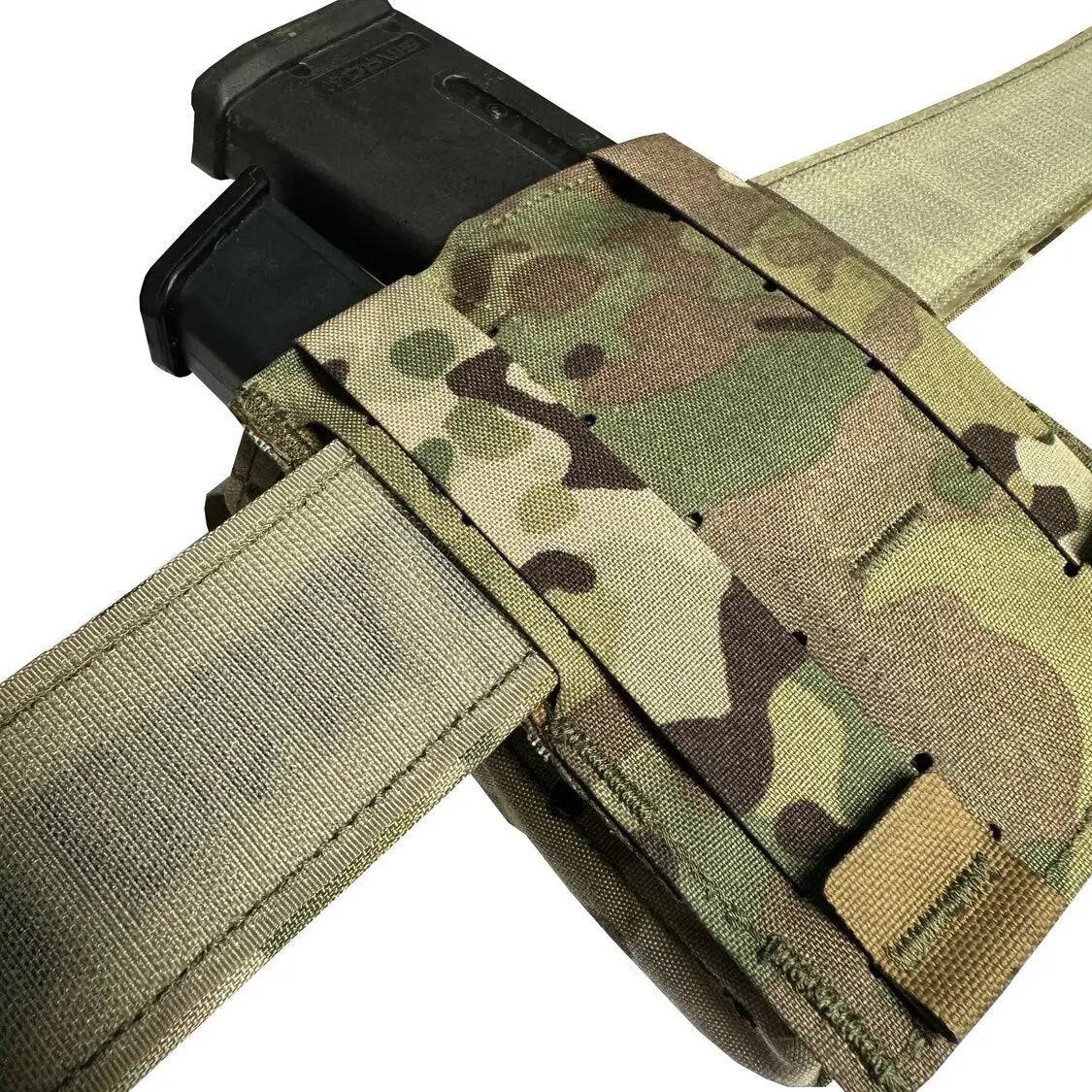 Back view of the Luminae Multicam Mega Pouch MTP attached to a tactical belt, highlighting its MOLLE-compatible design for versatile carrying options.