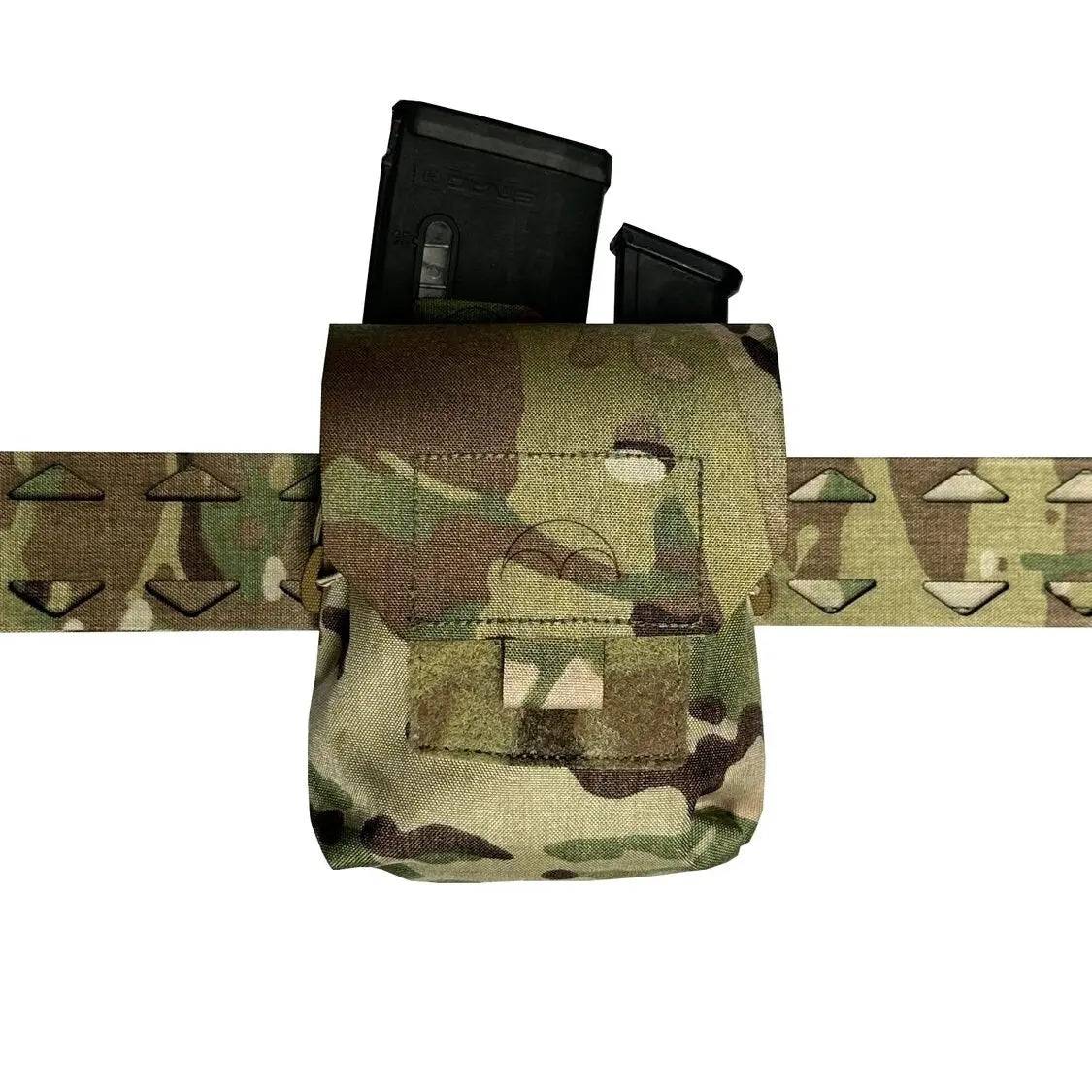 Luminae Multicam Mega Pouch MTP attached to a tactical belt, designed for securely carrying extra gear or magazines in rugged outdoor conditions.
