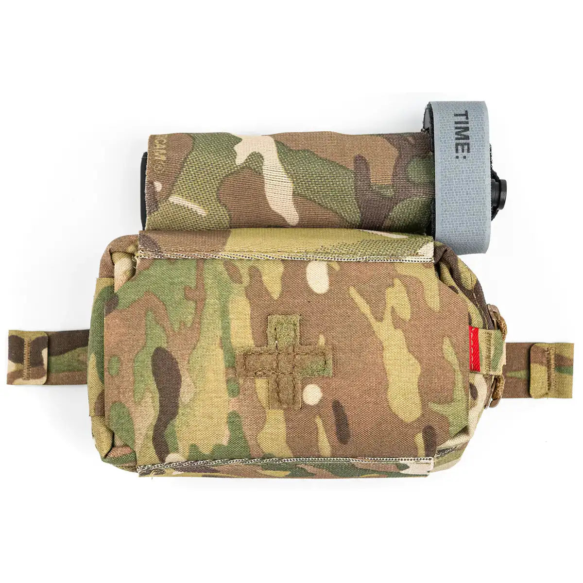Open Luminae Pull Out IFAK Medical Pouch showing interior compartments with medical supplies, camouflage fabric, and adjustable straps for tactical use