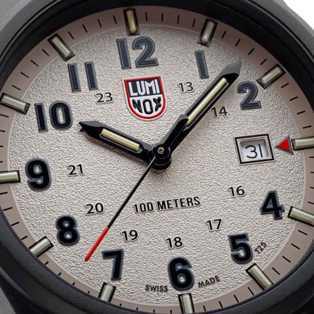 Close-up of Luminox Atacama Field 1960 Series Watch XL.1971.SET dial showing textured beige face, bold numerals, and date window.