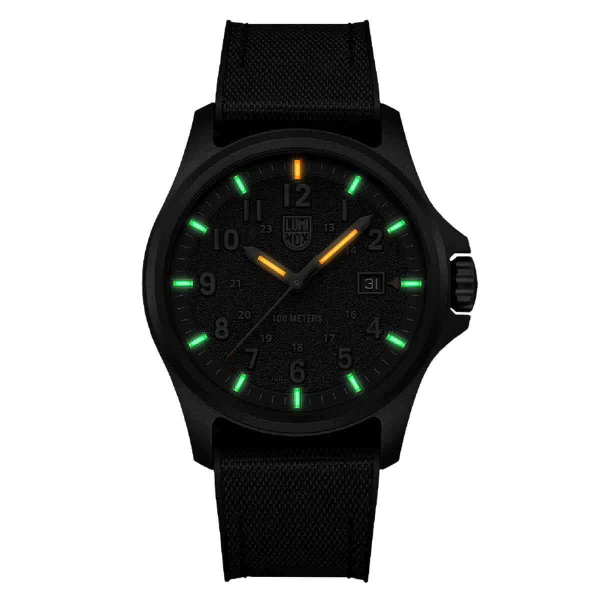 Luminox Atacama Field 1960 Series Watch XL.1971.SET glowing in the dark with green and orange luminous markers, ideal for night visibility.