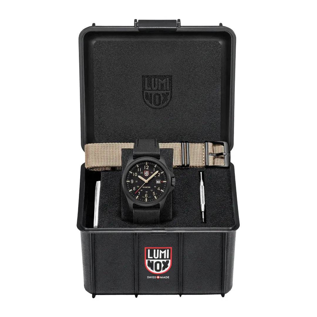 Luminox Atacama Field 1960 Series Watch XL.1970.SET presented in a black protective case with an additional sand-colored strap and a tool for easy strap changes.