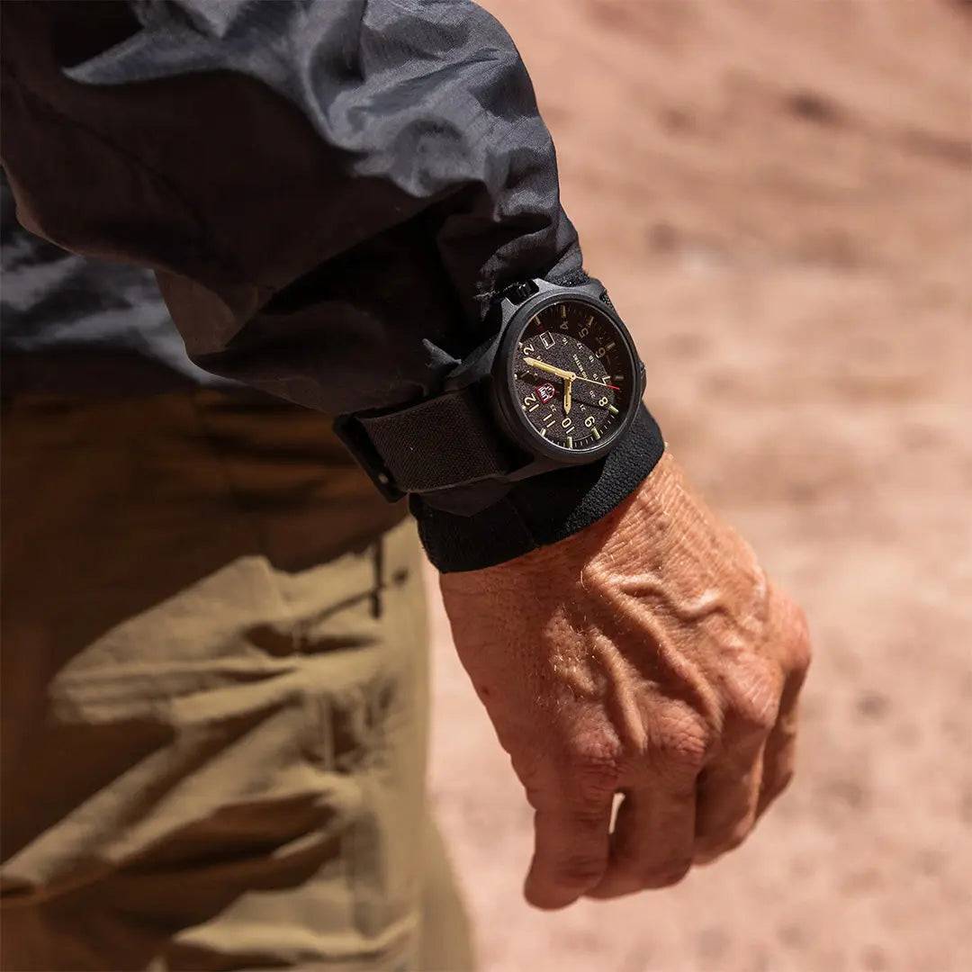 Luminox Atacama Field 1960 Series Watch XL.1970.SET worn on a wrist in an outdoor setting, showcasing its tactical and durable design for adventure enthusiasts.