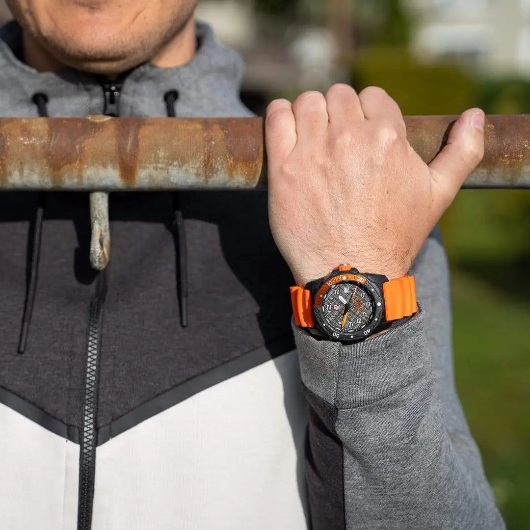 Luminox Bear Grylls Survival Explorer Watch 42mm XB.3729.NGU worn on wrist during outdoor workout, showcasing its sporty and rugged appeal.