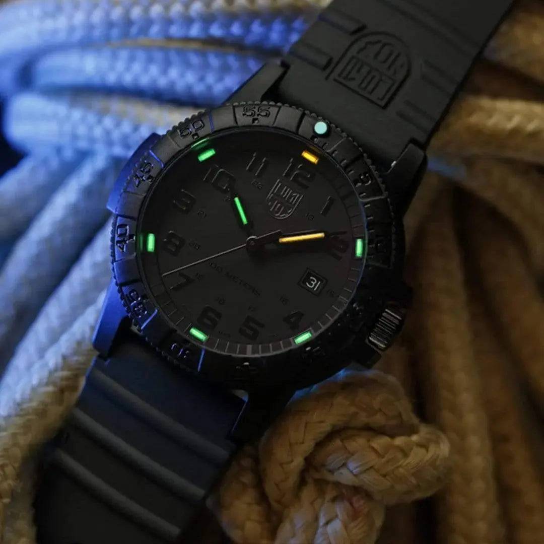 Luminox Leatherback Sea Turtle Giant Watch XS.0321.BO.L placed on coiled rope, highlighting its tactical design and luminescent markers in low light.