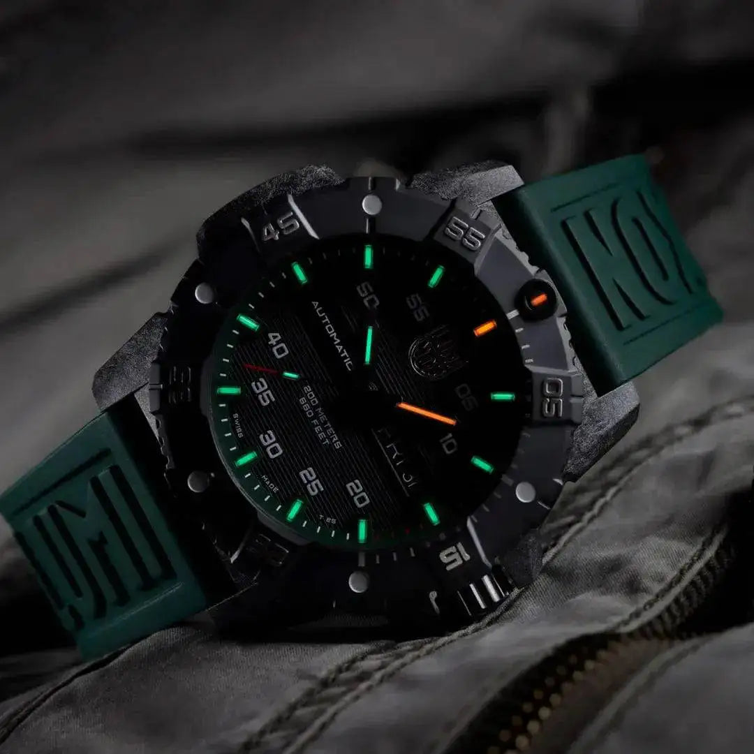 Luminox Master Carbon Seal Automatic 3860 Series Diver's Watch in a dimly lit setting, showcasing its luminous markers and rugged design. from John Bull Clothing