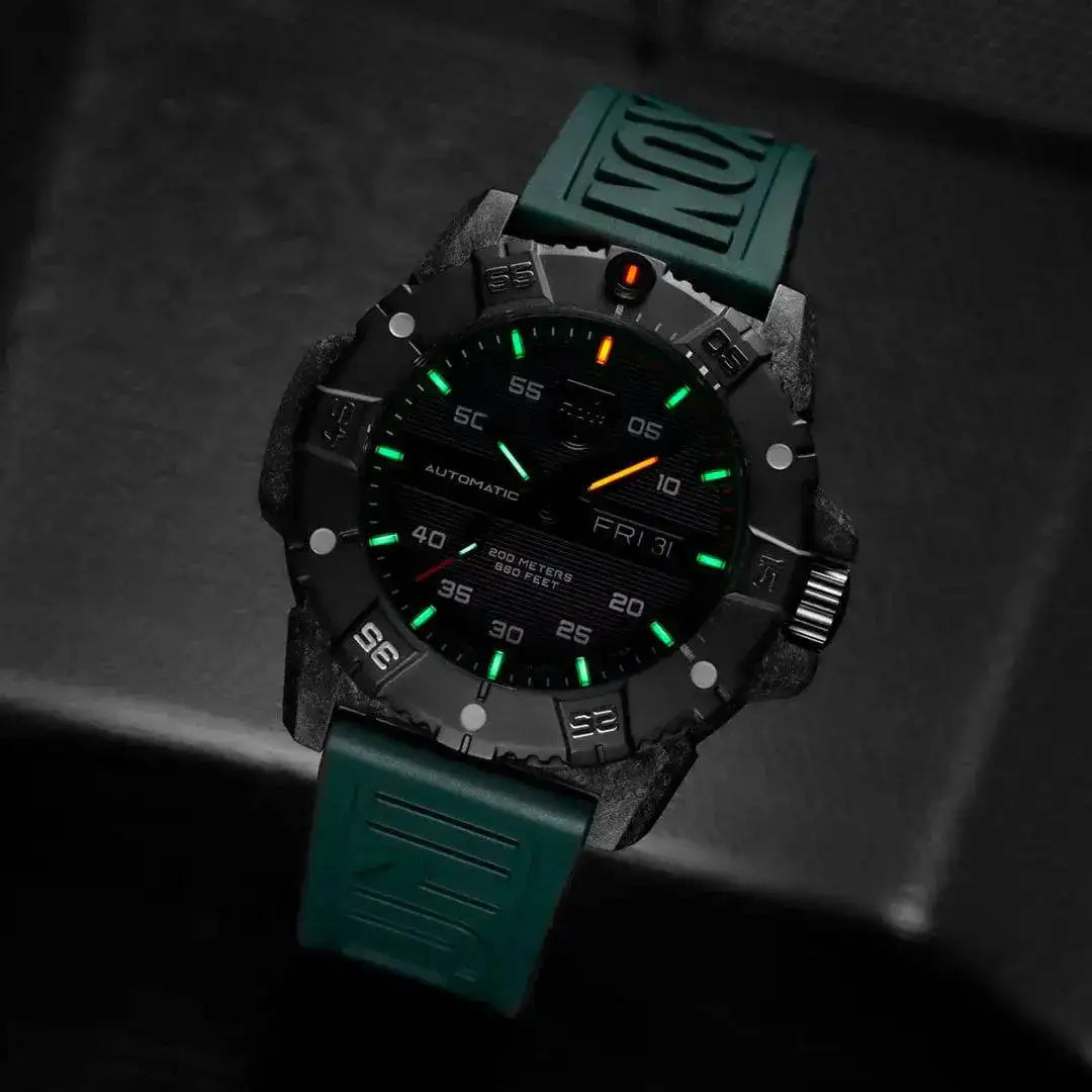 Luminox Master Carbon Seal Automatic 3860 Series Diver's Watch glowing in low light, emphasizing its self-powered illumination technology. from John Bull Clothing