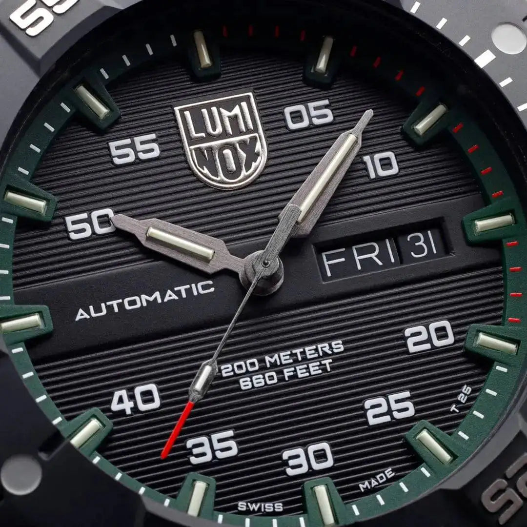 Close-up of the Luminox Master Carbon Seal Automatic 3860 Series Diver's Watch dial, showcasing the textured black face and luminous hands. from John Bull Clothing