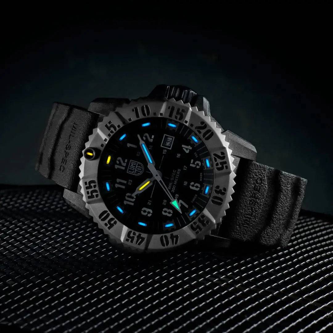 Luminox Mil-Spec 3350 Series Watch 46mm Black XL.3351.SET glowing in the dark with blue and yellow luminescent markers.