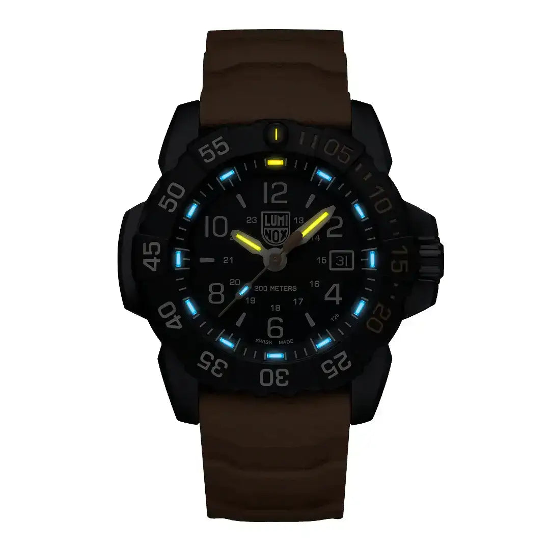 Close-up of Luminox Navy Seal Foundation Back to Blue military watch with luminous hands, orange accents, black case, and orange strap, SKU: JB1659