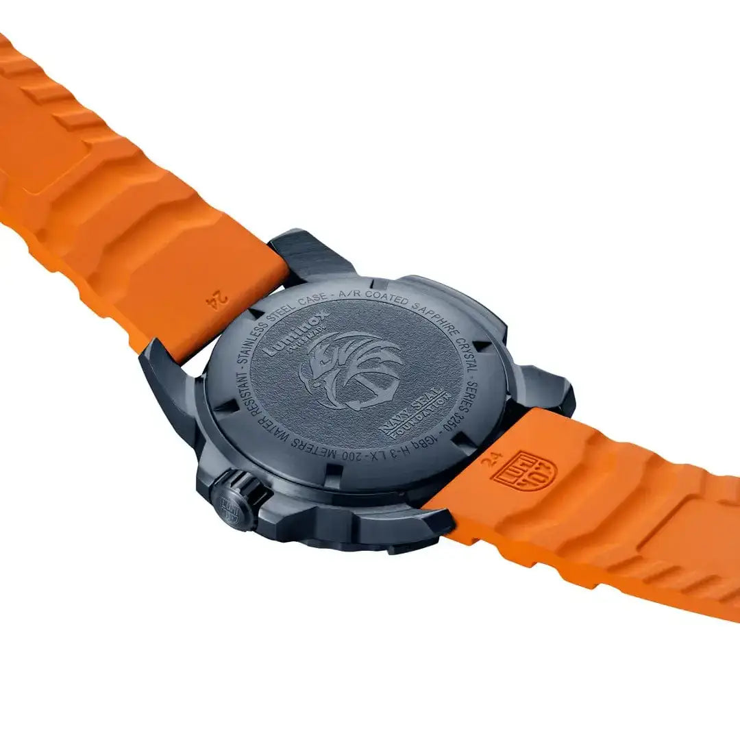 Back view of Luminox Navy Seal Foundation Back to Blue military watch with black stainless steel case and orange rubber strap, engraved logo