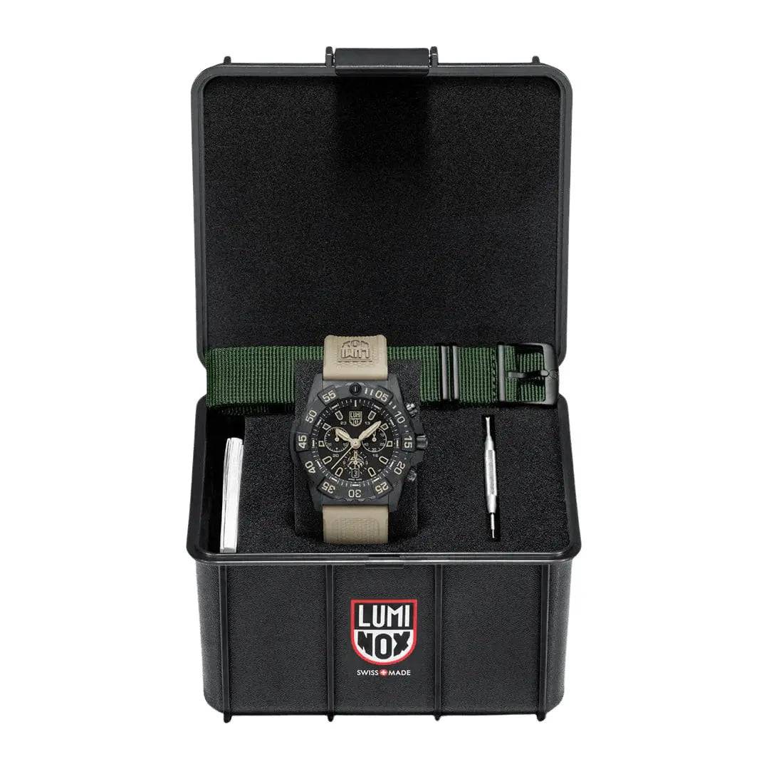 Luminox Navy SEAL Foundation Chronograph Dive Watch in a black protective case with an extra strap and tool for customization.