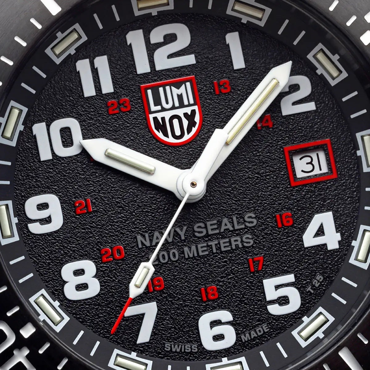 Close-up of the Luminox Navy Series Watch 4230 Series XS.4231.SET dial, showing bold white numerals, red accents, and a date window at 3 o’clock. from John Bull Clothing