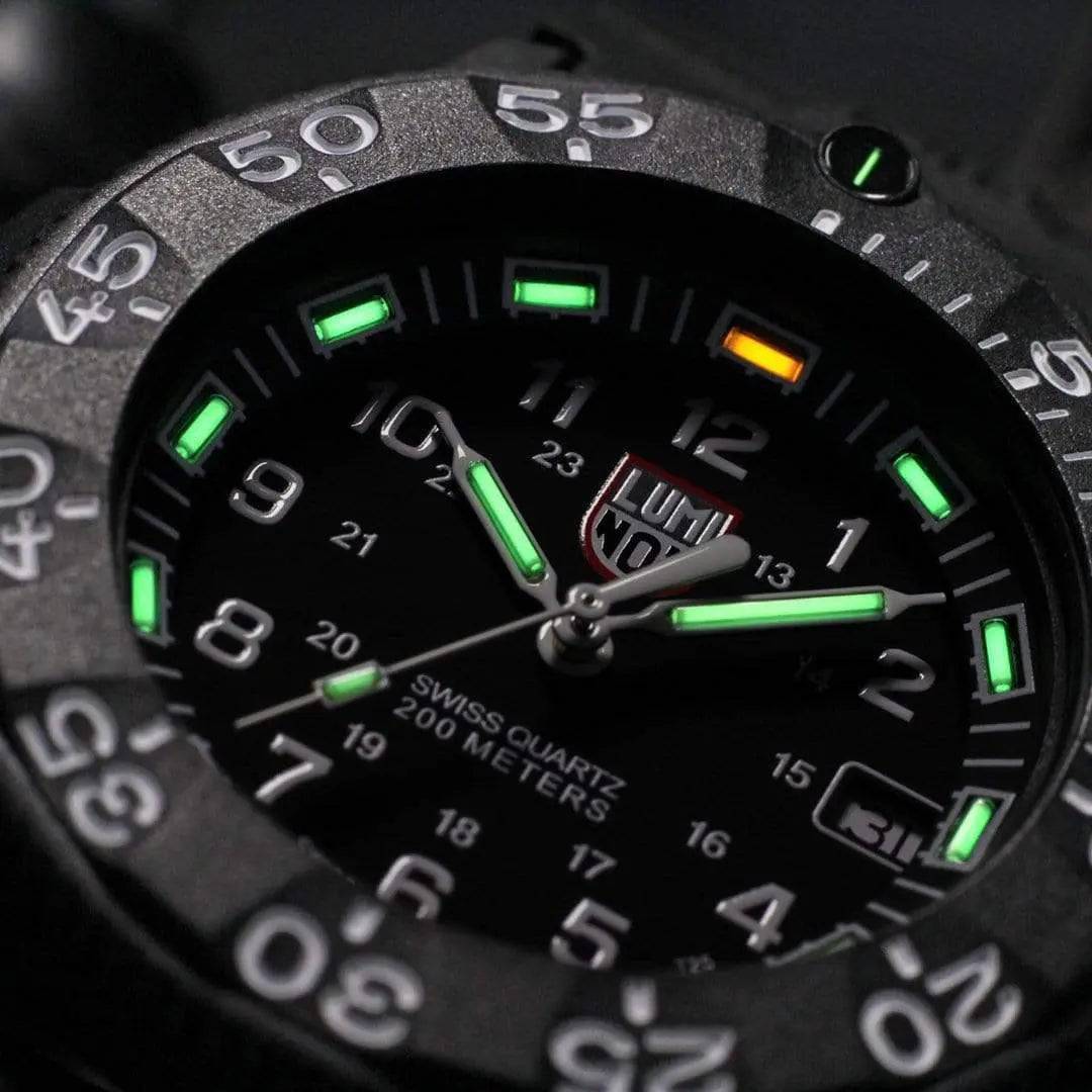 Close-up of Luminox Navy Seal 3000 Series Diver Watch XS.3001.F highlighting its tritium gas tube illumination and durable black CARBONOX case.