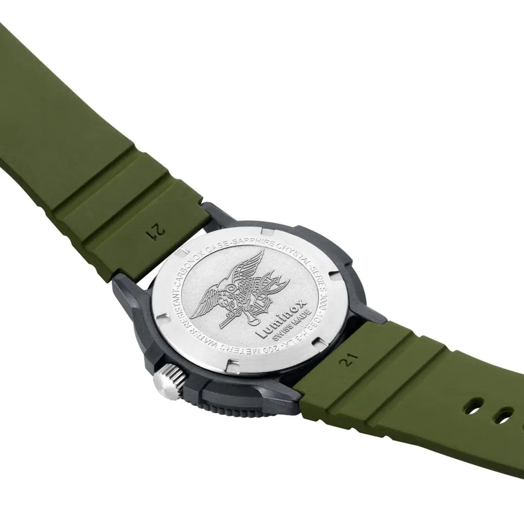 Back case of Luminox Navy Seal 3001 Dive Watch engraved with Navy Seal emblem, highlighting its military-grade build.