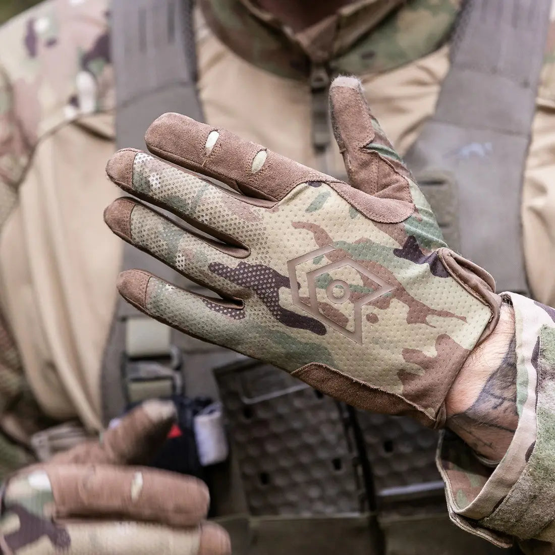 MoG Target Light Duty Gloves Multicam worn in field, showcasing flexible fit and camo pattern for professional tactical and safety operations.