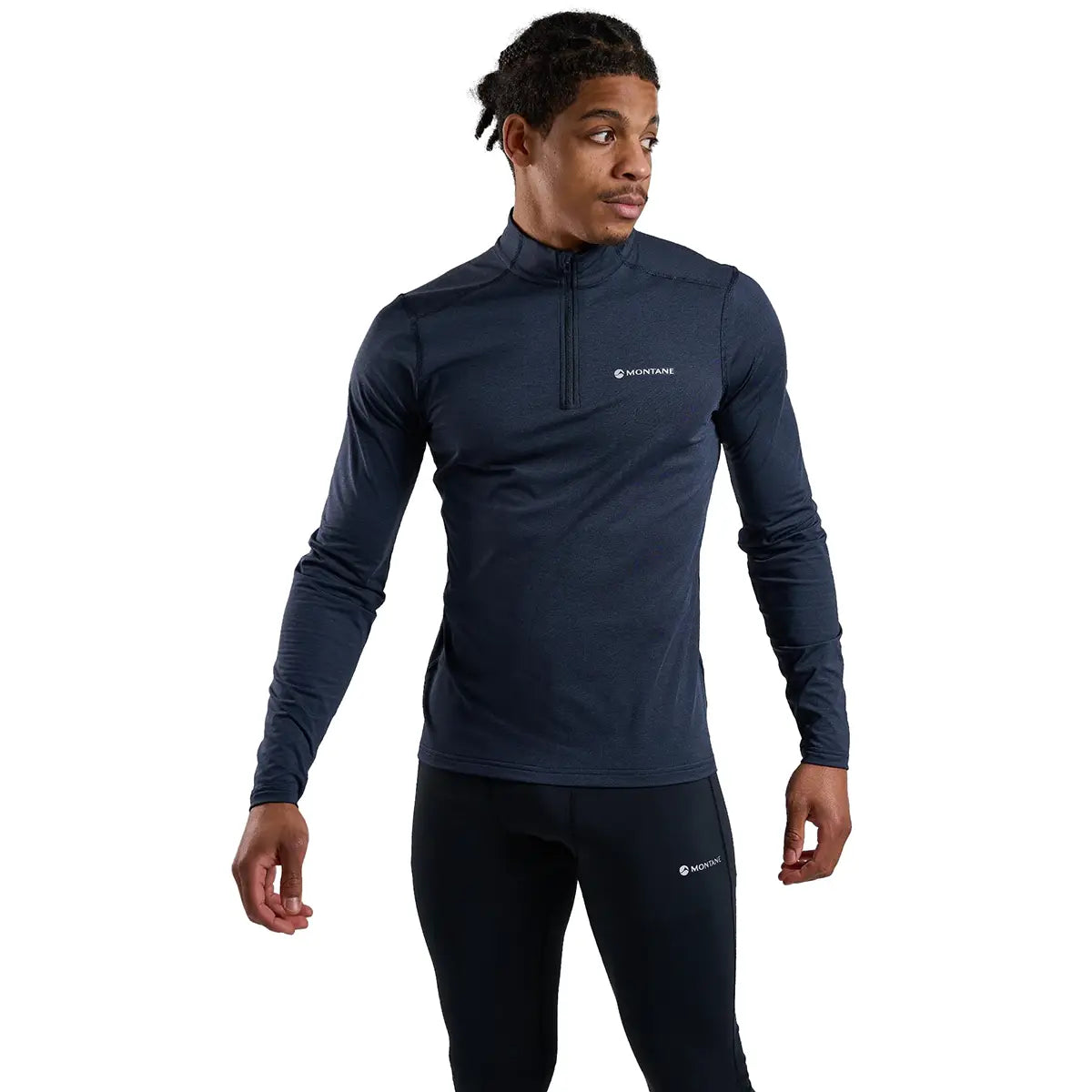 Model wearing Montane Mens Dart XT Zip Neck Long Sleeved Thermal Top in navy, demonstrating athletic fit and cold-weather layering.