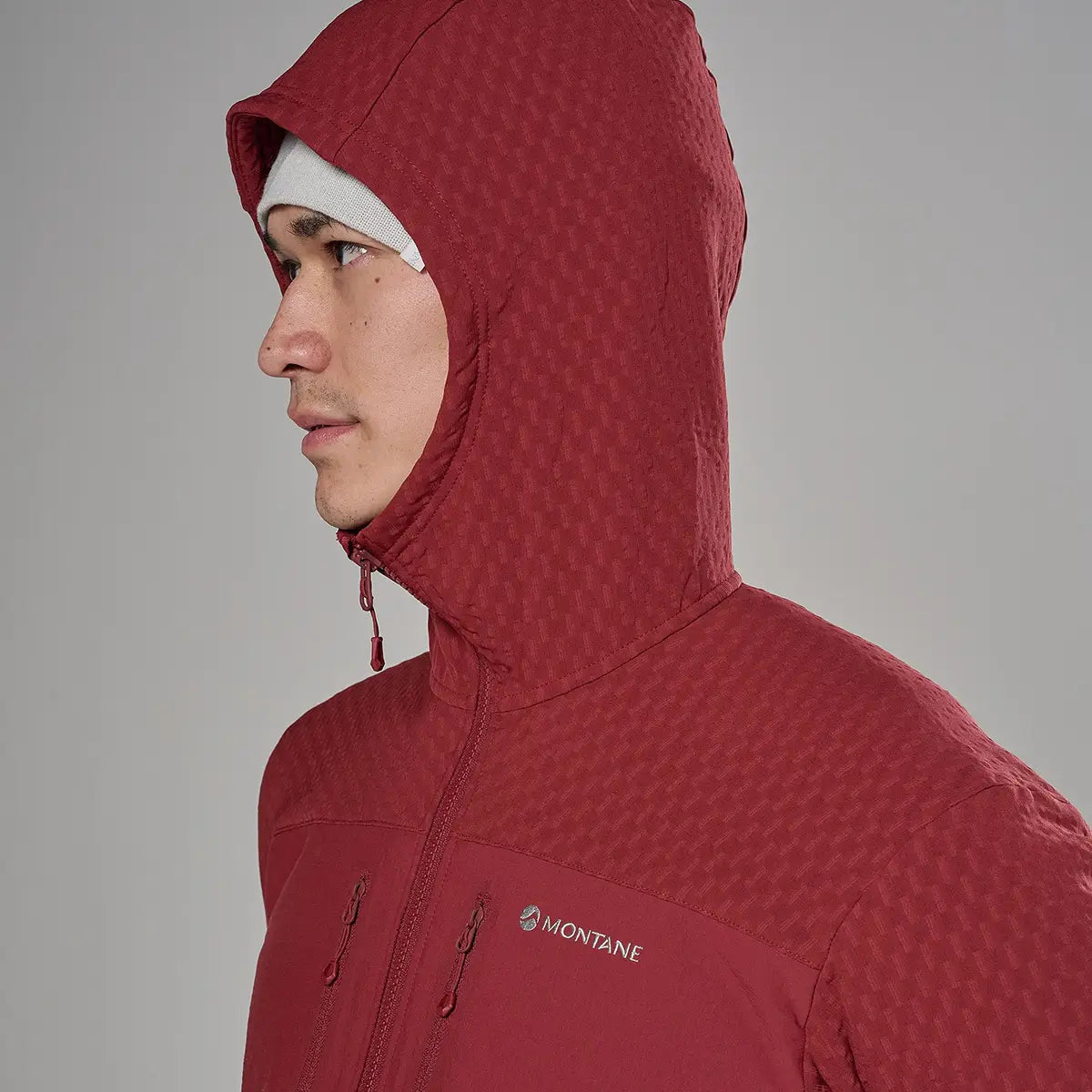 Red Montane Dura XT Hoodie fleece with textured fabric, hooded design, front zipper, and logo detail, ideal for outdoor activewear