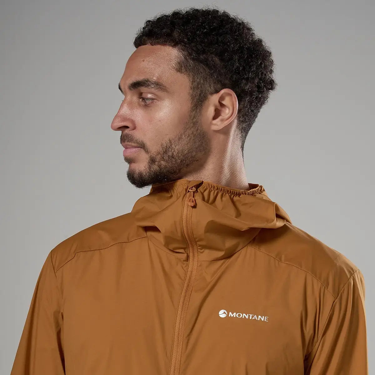 Montane men's featherlite hooded windproof jacket in brown, outdoor apparel, lightweight windbreaker for men