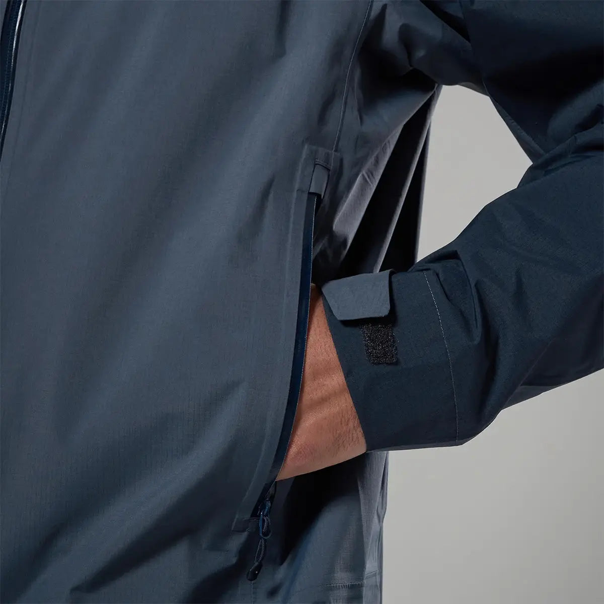 Close-up of Montane waterproof jacket with zipper and pocket detail