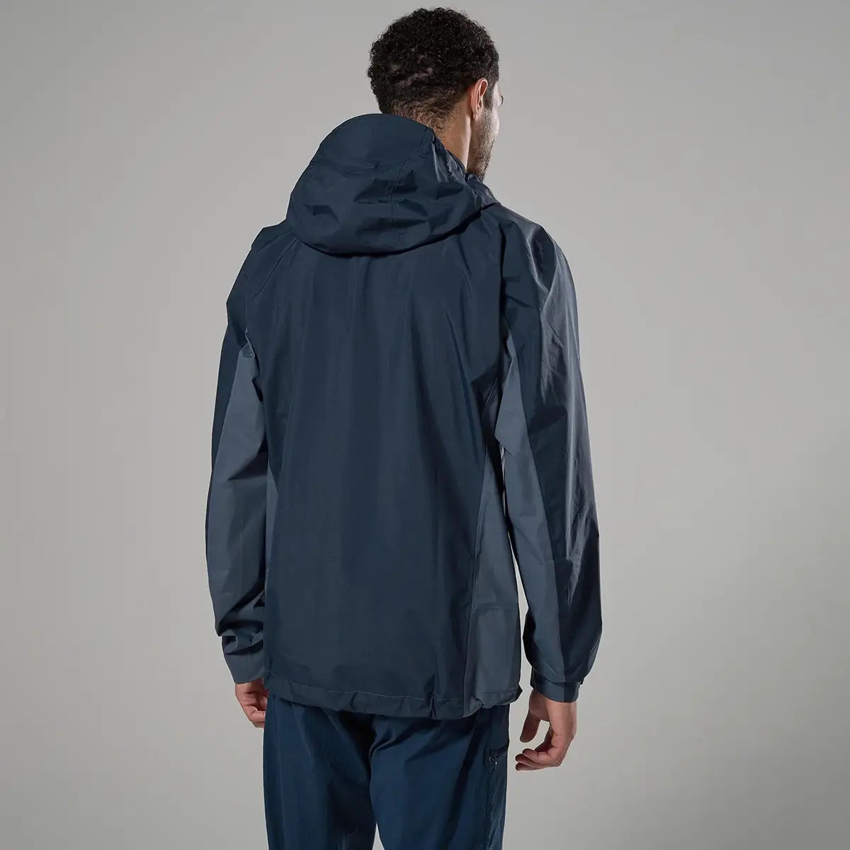 Men wearing Montane waterproof jacket with hood, outdoor apparel