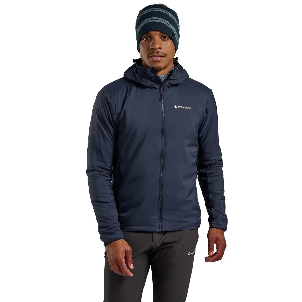 Model wearing Montane Mens Sirocco Hooded Insulated Jacket in navy, styled for active outdoor and urban environments.