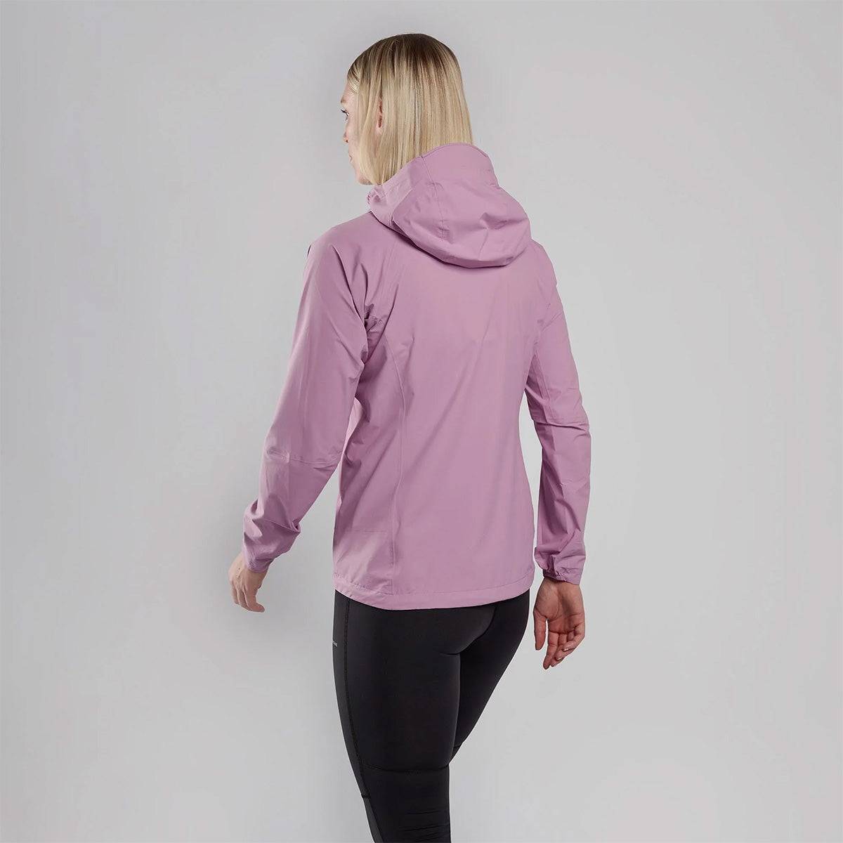 Back view of pink Montane Womans Minimus Lite Waterproof Jacket, showing hood and ergonomic design for outdoor movement and comfort.