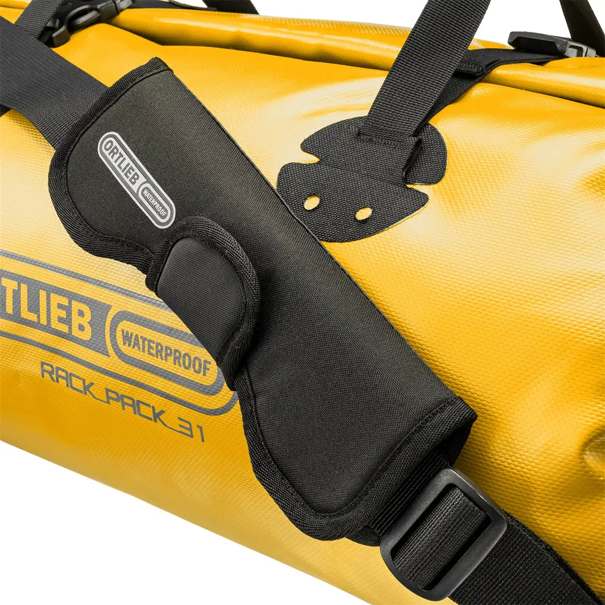 Shoulder strap detail of yellow Ortlieb Rack Pack 31L Waterproof Duffle Bag with padded support for comfortable carrying on long trips.
