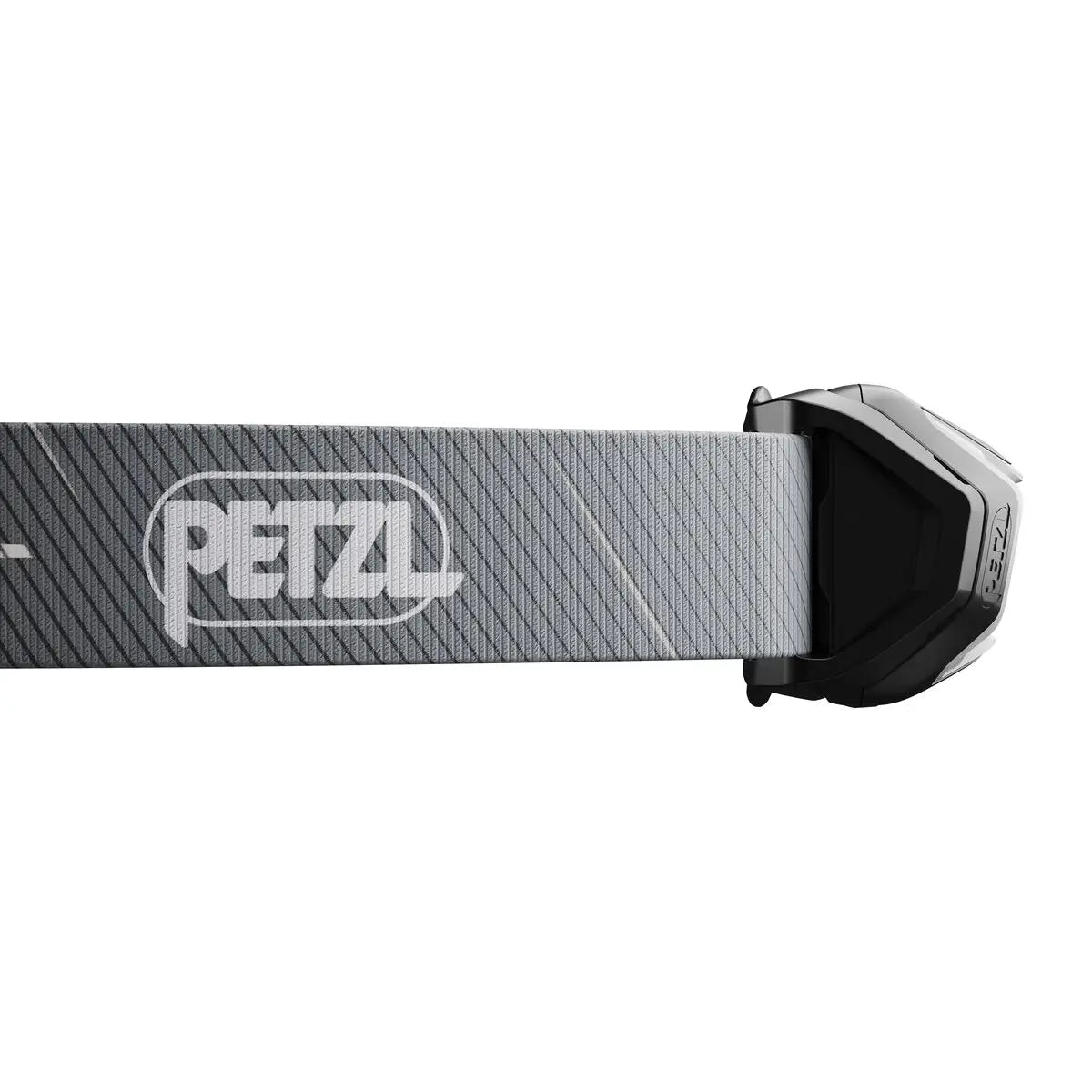 Close-up of grey Petzl Tikka Core Headtorch strap with logo, showcasing durable and adjustable headband for secure fit.