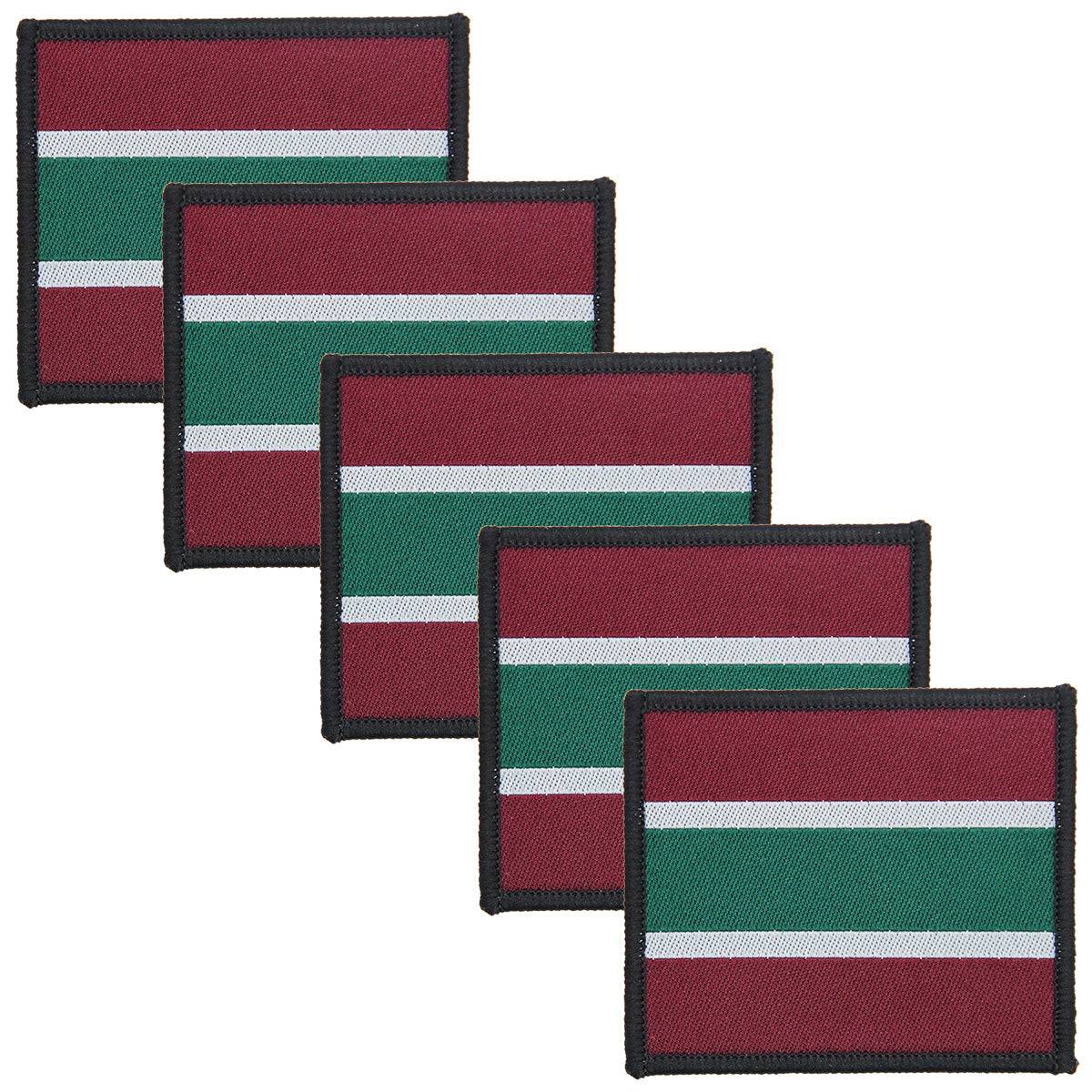 Pack of five Royal Army Medical Services RAMS Iron On TRF Badges, regulation pattern for military uniforms, in maroon, green, and white.